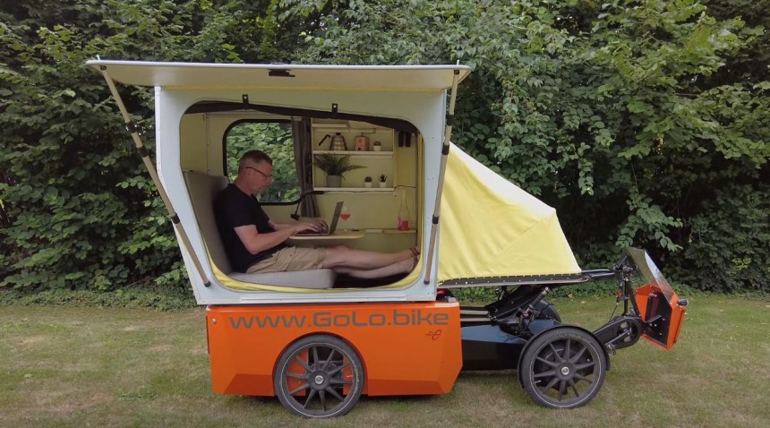 The GoCamp bike camper sits on the GoLo cargo e\-bike and offers almost all creature comforts of home