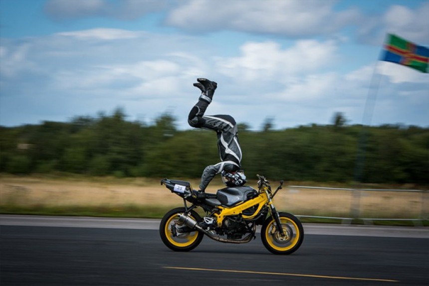 Marco George sets world record for fastest speed on a motorcycle while doing a headstand, August 2019