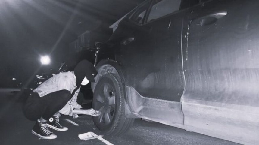 Activists Deflating SUV Tires