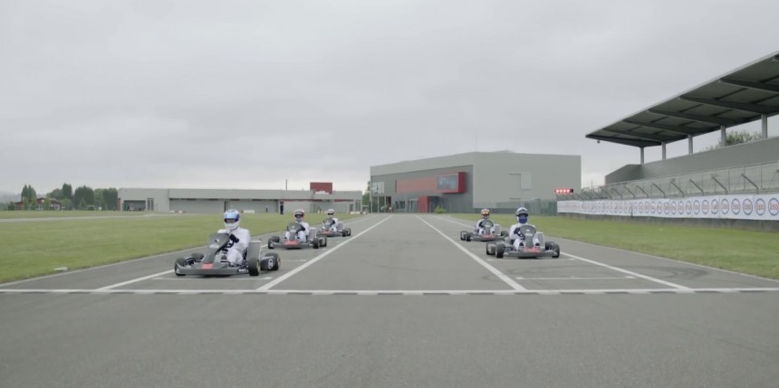McLaren Formula One Champions drive go\-karts on track