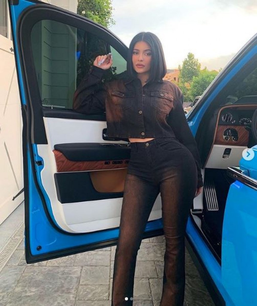 Kylie Jenner often uses her cars as props for self\-promotion pics