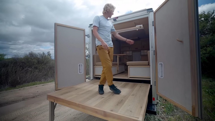 Inconspicuous Box Truck Camper Hides a Game\-Changing Layout With a Unique Levitating Desk