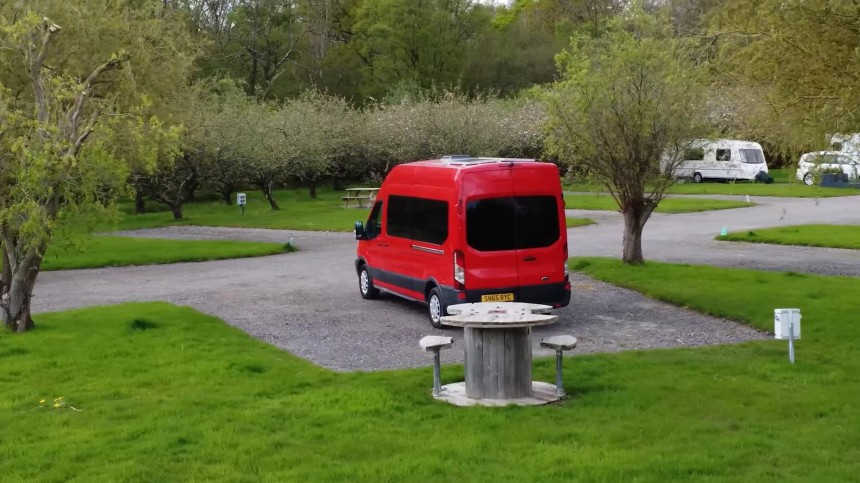 This Stealthy, Off\-Grid Camper Van Boasts a Fancy Interior With a Hidden Shower