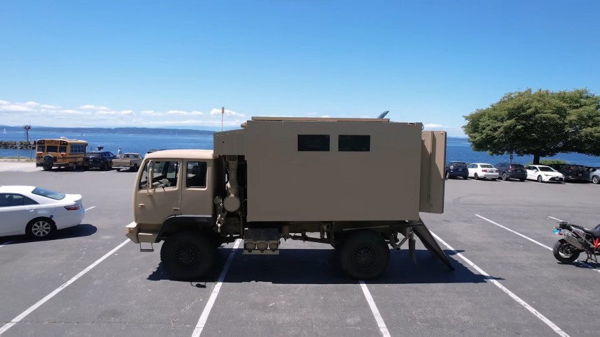 Insane \$105K Army Truck RV Features a Motorcycle Garage and an Elevator Bed