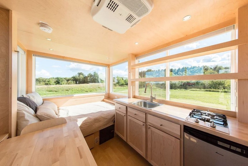 The Vista features wraparound glazing and a clean, minimalist interior, earning the title of world's most beautiful tiny home