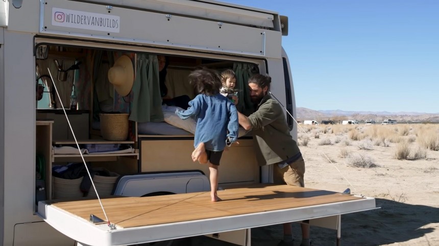 Japanese Minibus Is a Tiny Mobile Home for a Family of Four, One of Its Walls Is a Deck
