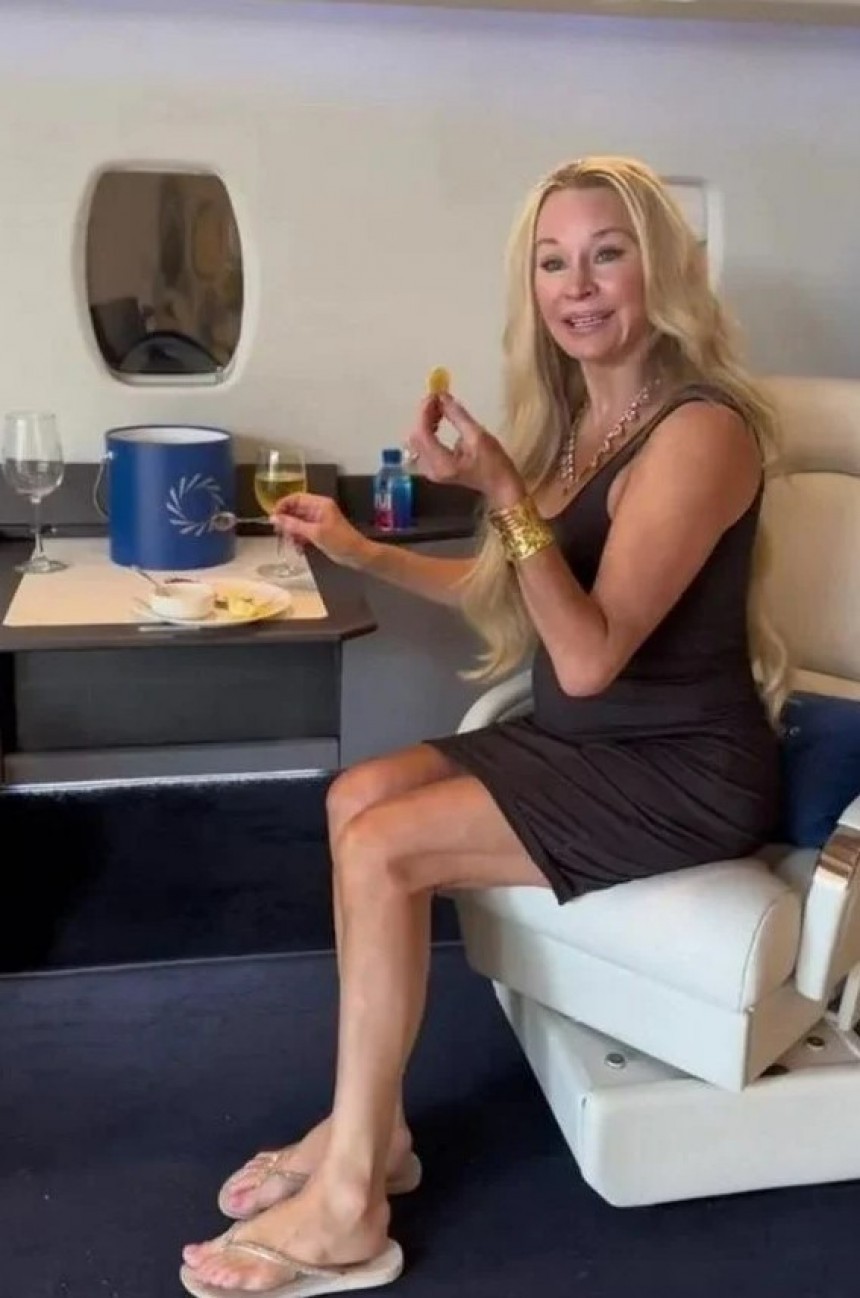 Jackie Siegel munches on caviar inside a private jet cabin set up in her living room