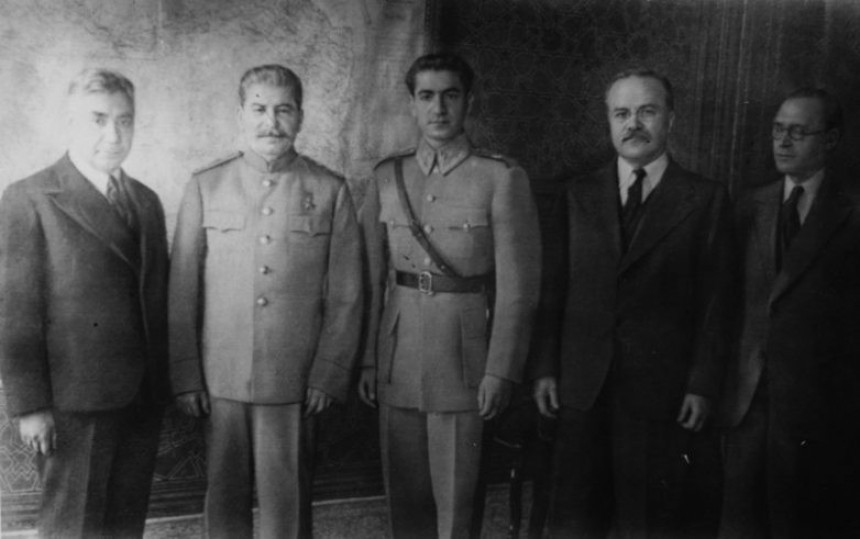 The Young man in the center is the Shah of Iran\. the man on his right is Joseph Stalin\. Iran, 1943 Peace Conference