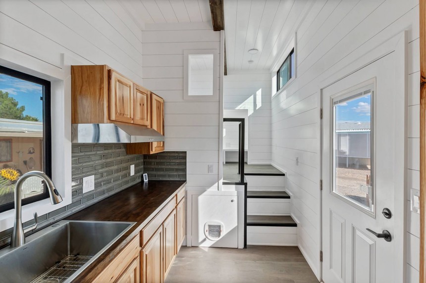 Sands Tiny Home Boasts an Ingenious Layout With Downstairs Bedroom and Raised Living Room