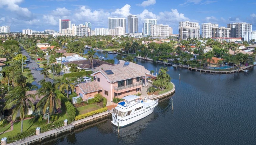 Waterfront Florida mansion comes with Hatteras yacht Ocean's Grace part of the \$10 million deal