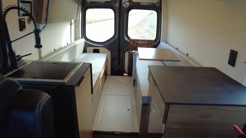 Sprinter Camper Van With a Cozy Pop\-Top Roof Can Accommodate up to Five People