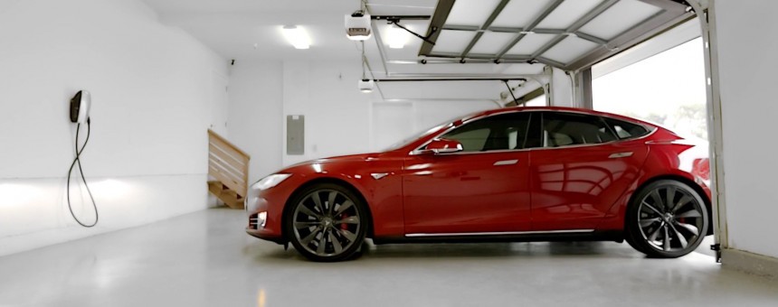 Tesla Model S drives itself out of garage