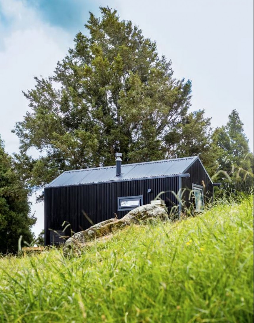 The Buster tiny is the perfect woodland retreat, off\-grid, minimalist and cozy
