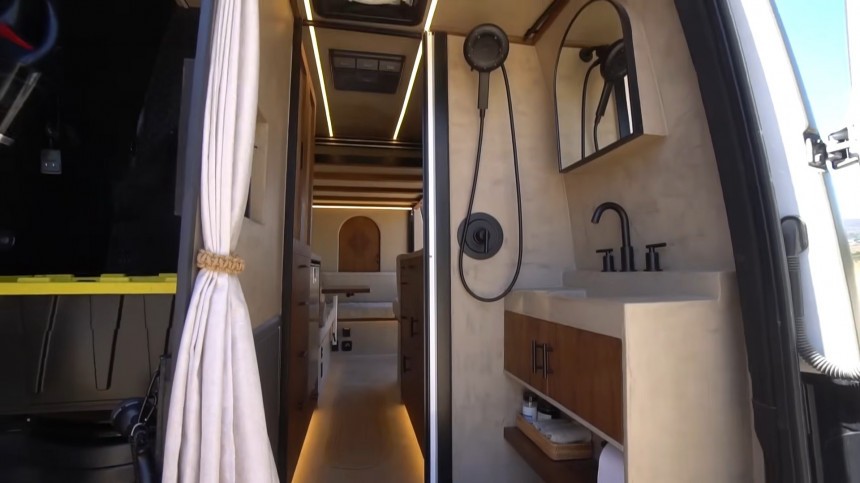 The "Concrete Oasis" Is a Deluxe Camper Van With an Elevator Bed and Plenty of Open Space