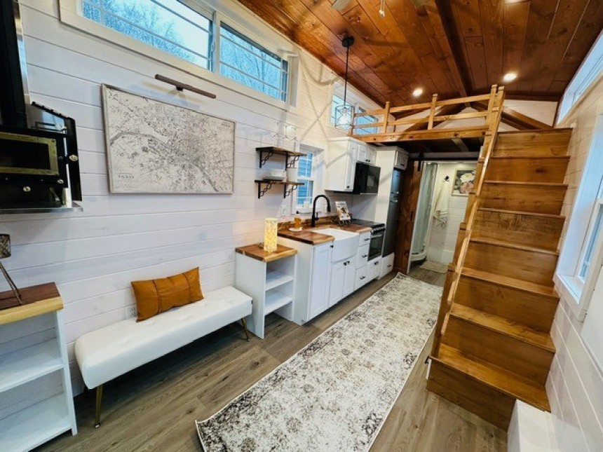 The Cottage tiny house with two lofts and main\-floor bedroom