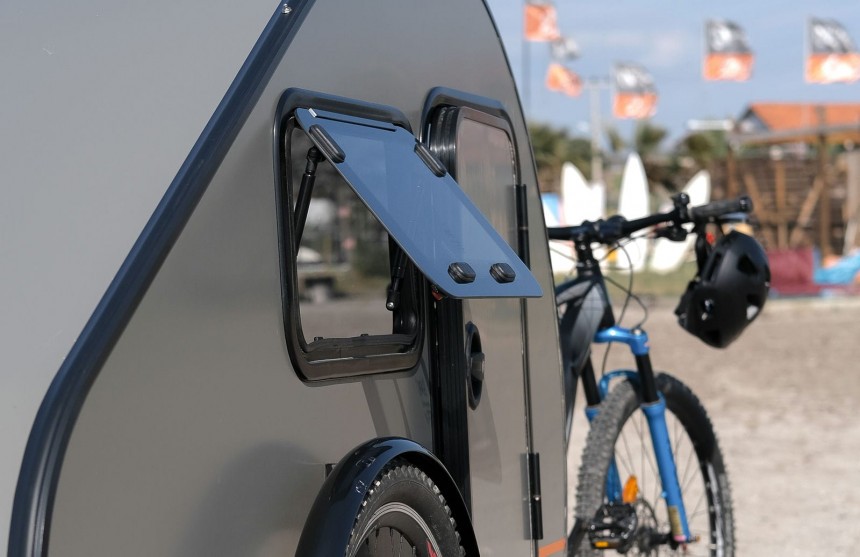 The RoadSnailCamper is an e\-bike teardrop trailer that renders bikepacking obsolete