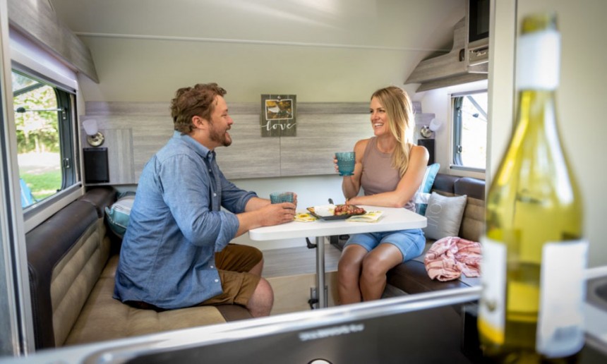 The Ultimate Camper offers a full wet bath, two kitchens and queen\-size bed, in the small footprint of a teardrop trailer