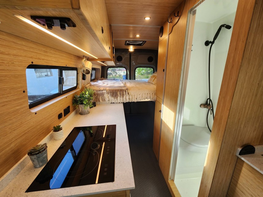 There's No Place Too Off\-Grid for This Seriously Equipped, Pop\-Top Tiny Home on Wheels