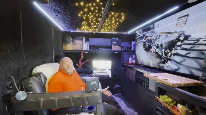 This 6x6 Camper Is the Ultimate Off\-Grid Man Cave With a Huge Garage and a Movie Theater