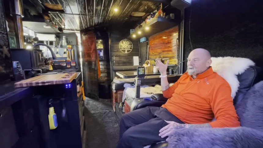 This 6x6 Camper Is the Ultimate Off\-Grid Man Cave With a Huge Garage and a Movie Theater