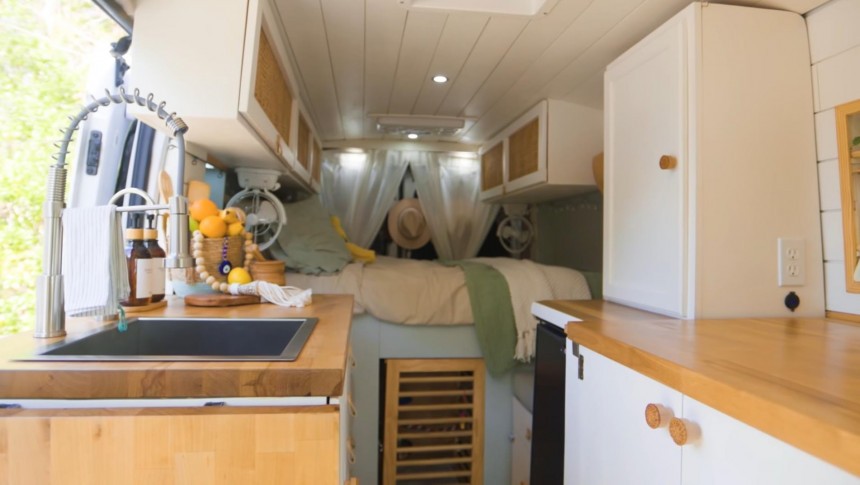 This Pet\-Friendly Camper Van Is a Cozy Tiny Home on Wheels With a Hidden Bathroom
