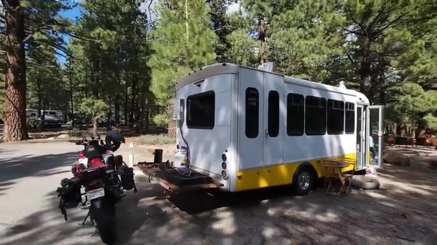 This Shuttle Bus Is an Affordable Off\-Grid Home on Wheels With a Hidden Bathtub