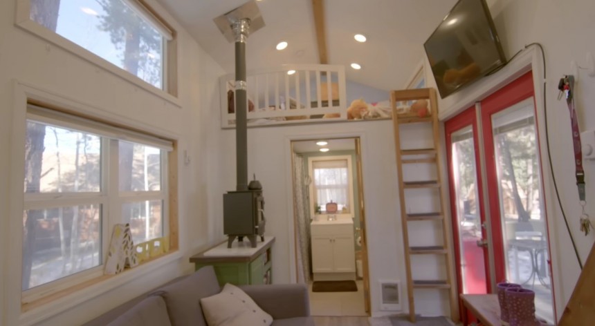 Tiny home for a family of four with a full bath and two lofts