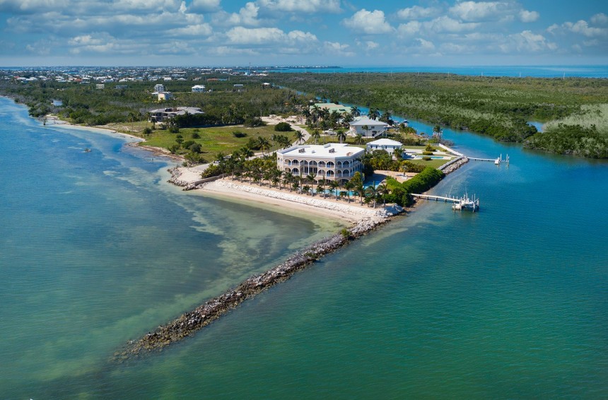 Florida Keys mansion with 340\-degree panoramic views of turquoise water can be yours if you're willing to trade\-in your car collection