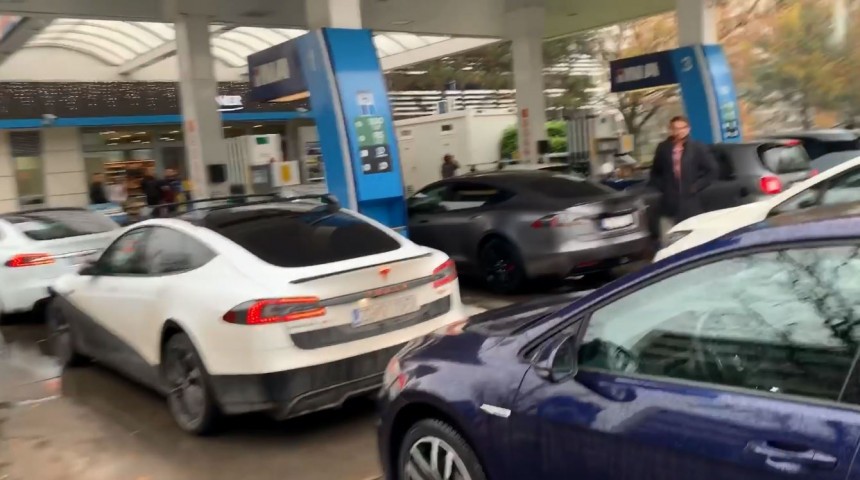 Tesla EVs at a Gas Station