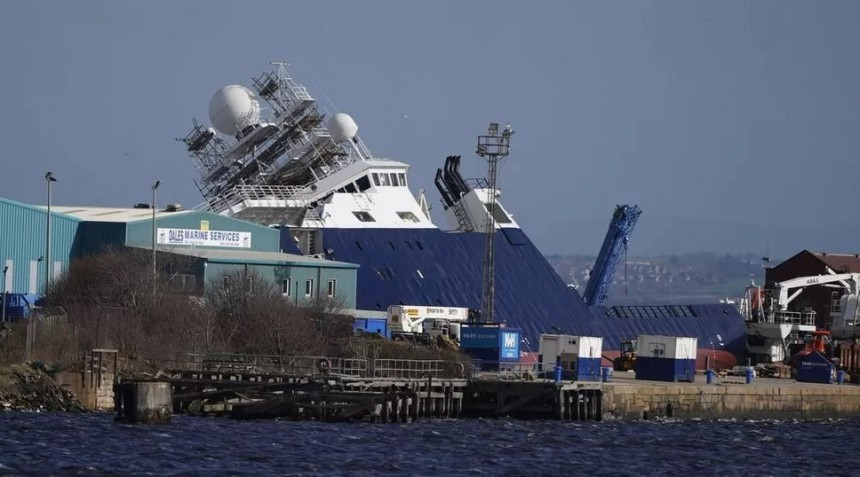 RV Petrel, once owned by Paul Allen now the property of the U\.S\. Navy, tipped over to its side after strong winds