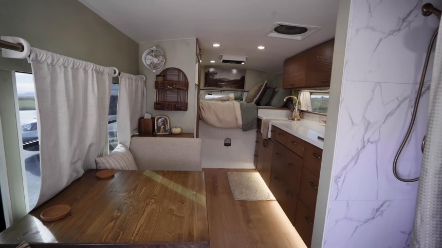 Veteran Couple Converted a Short Bus Into a Striking, Off\-Grid Tiny Home on Wheels