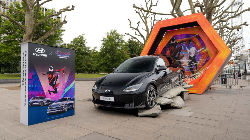 Web\-Covered Hyundai Ioniq 6 Teleports Out of a Spider\-Verse Portal in Central London