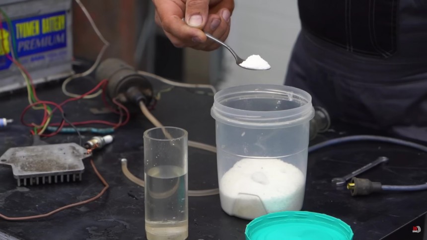 Does gasoline work better than water as spark fluid\?