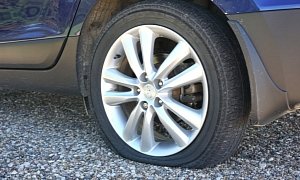 100 Cars Get Flat Tires After Commercial Dump Truck Spills Load of Scrap Metal