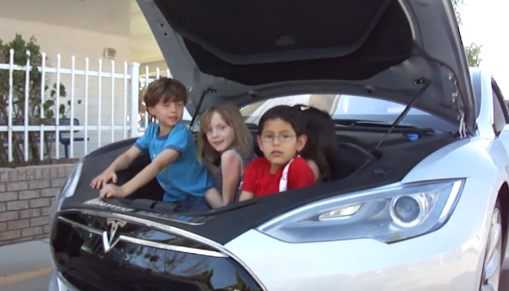 4 kids under the bonnet of Tesla