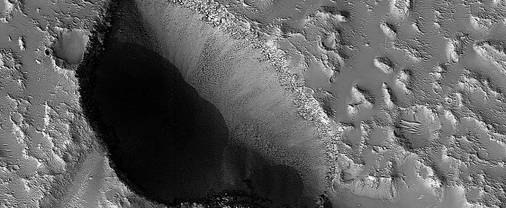 Flood pit in the Hebrus Valles on Mars