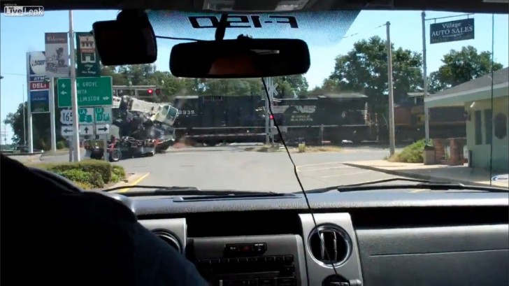 Train smashes through 18 wheeler