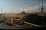 18-Wheeler Carrying Logs Topples Over in Russia