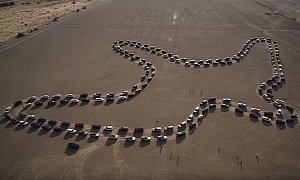 180 Nissan Patrols Drive in Sync to Form a Giant Desert Falcon and Set a Record