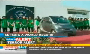 19 Girls Cram into a smart for Guinness Record