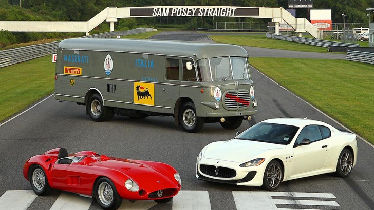1952 Fiat 642 Transporter poses with two Maseratis