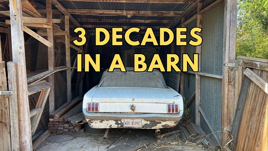 1964 1/2 Mustang parked in a barn