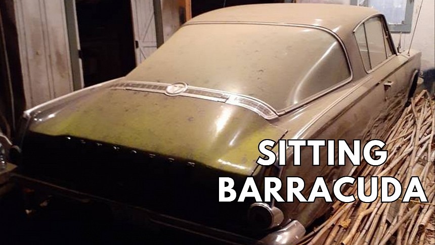 The Barracuda is sleeping under a car port