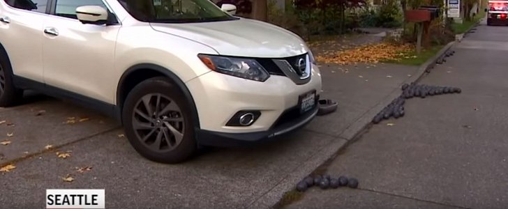2-pound metal balls roll down Seattle street, cause damage to 6 cars