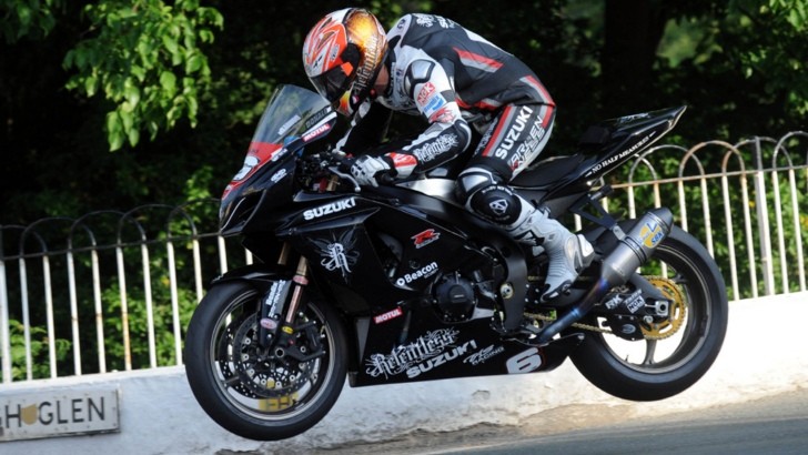 Cameron Donald riding a Suzuki motorcycle in the Isle of Man TT
