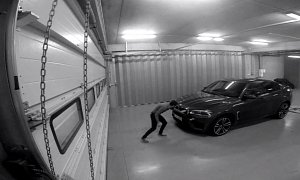2015 BMW X6 M Roars Its New V8 for the Camera