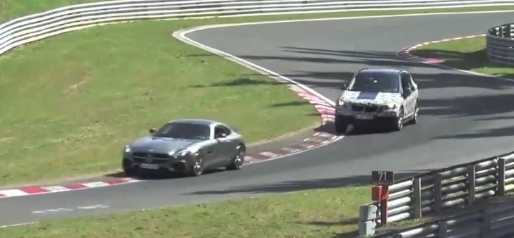 BMW X1 testing against AMG GT