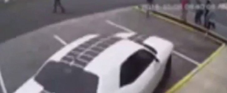 Woman runs over man with her Dodge Challenger, after verbal dispute