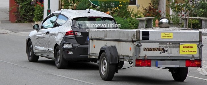 2018 Ford Fiesta Mk7 (three-door model towing a cargo trailer)