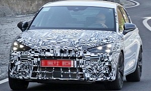 2024 Cupra Leon Spied, Sporty Hatch Shows Tavascan-Inspired Face Beneath Camouflage